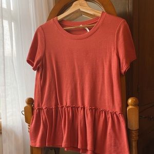 red-orange flowy top